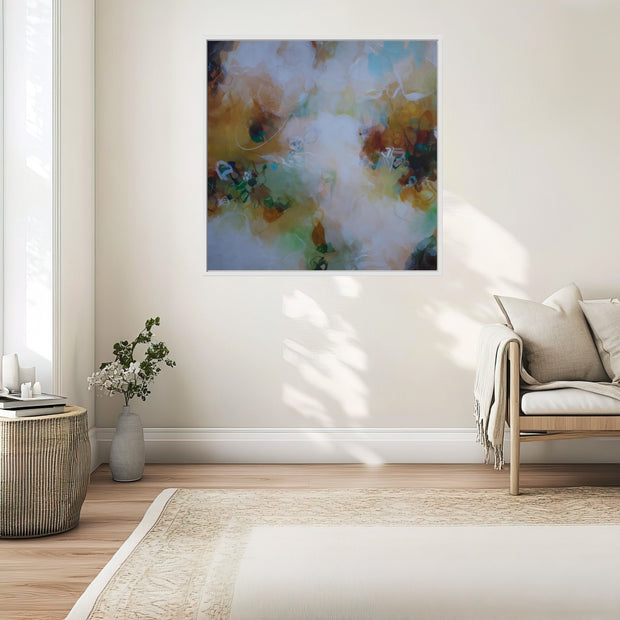Living room with a colorful abstract painting on the wall, a couch, and a small table with a plant.