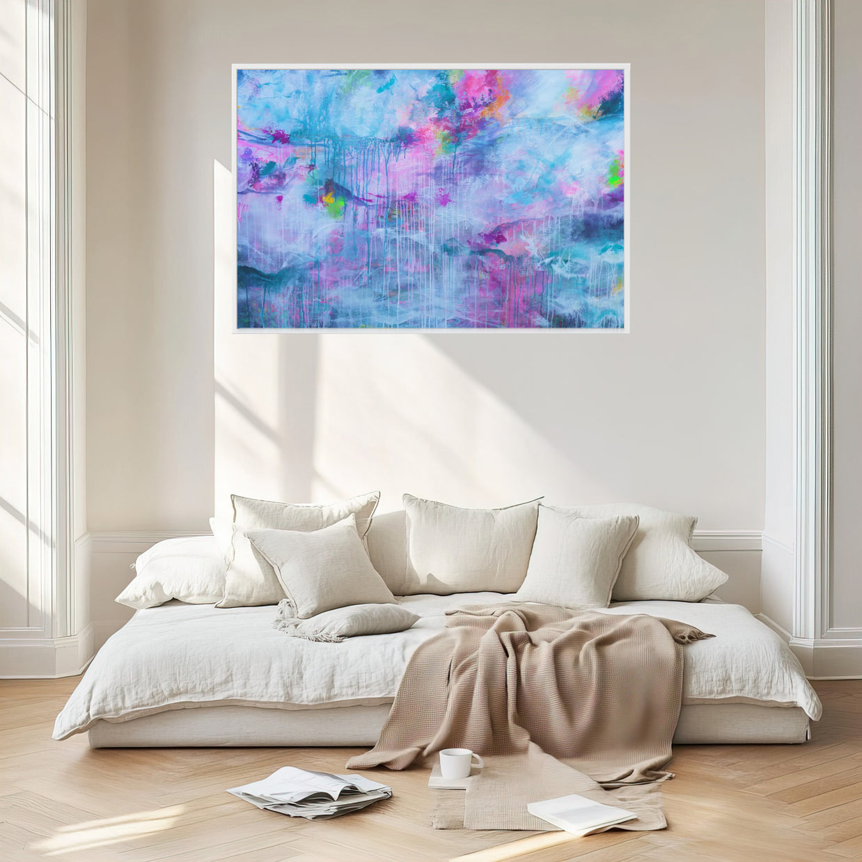Modern bedroom with a colorful abstract painting above a bed.