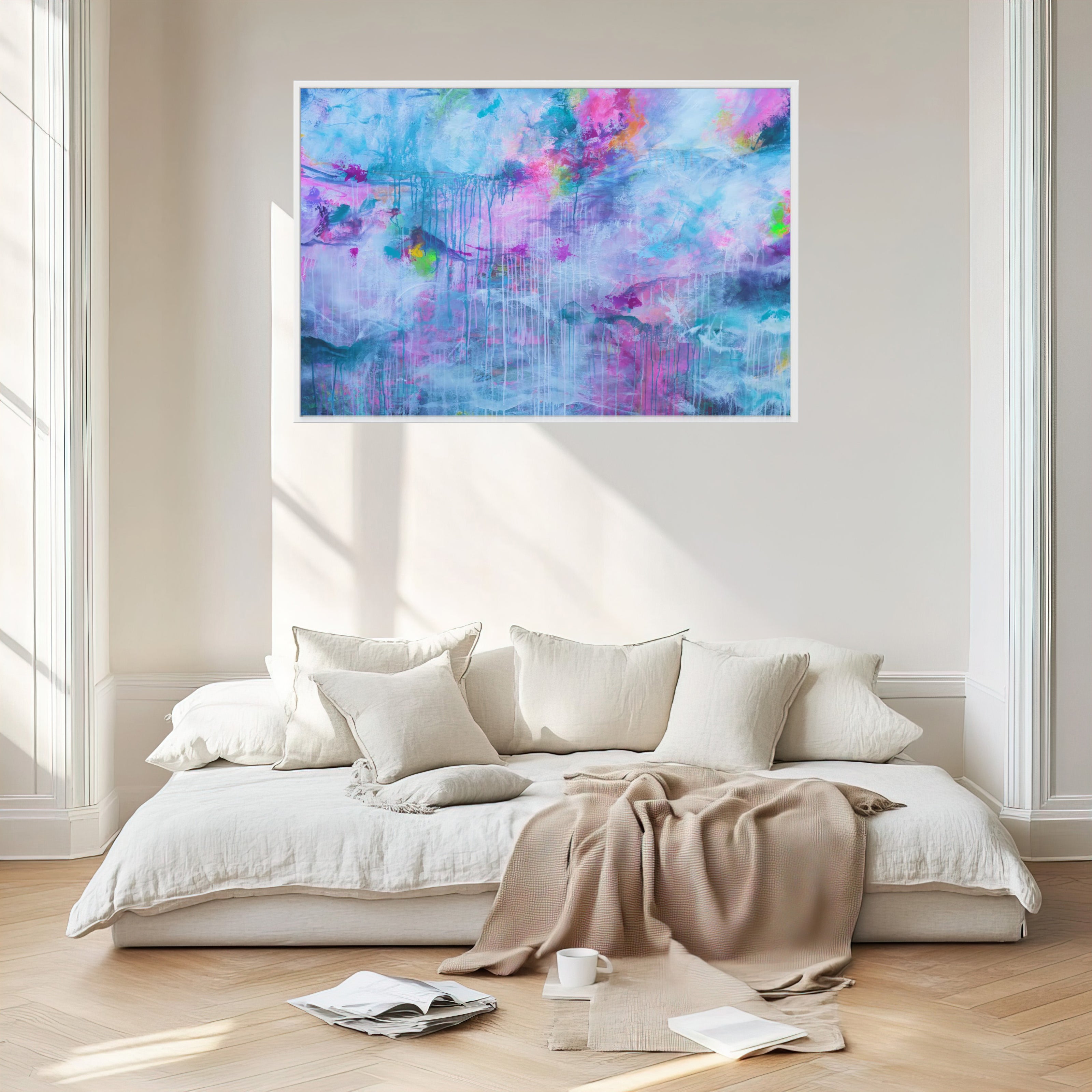Modern bedroom with a colorful abstract painting above a bed.