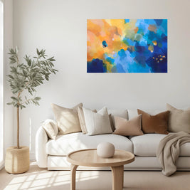 Modern living room with a colorful abstract painting on the wall, white sofa, and wooden coffee table.