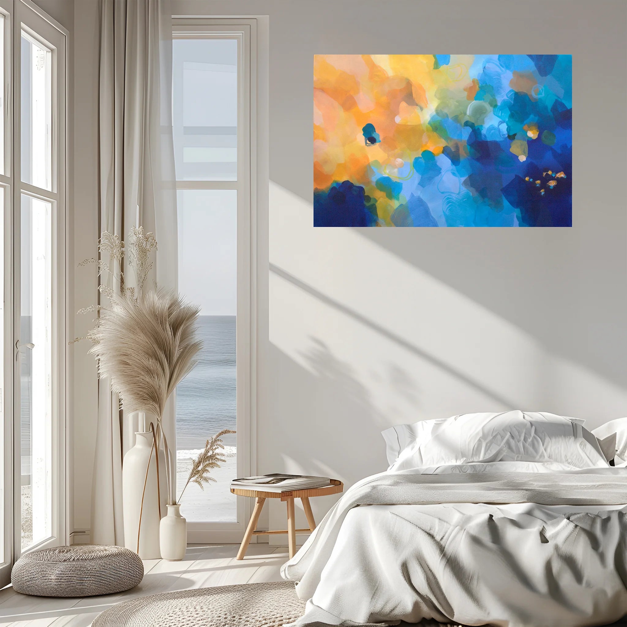 Colorful abstract painting on a wall above a bed in a bright bedroom.