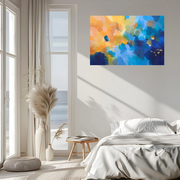Colorful abstract painting on a wall above a bed in a bright bedroom.