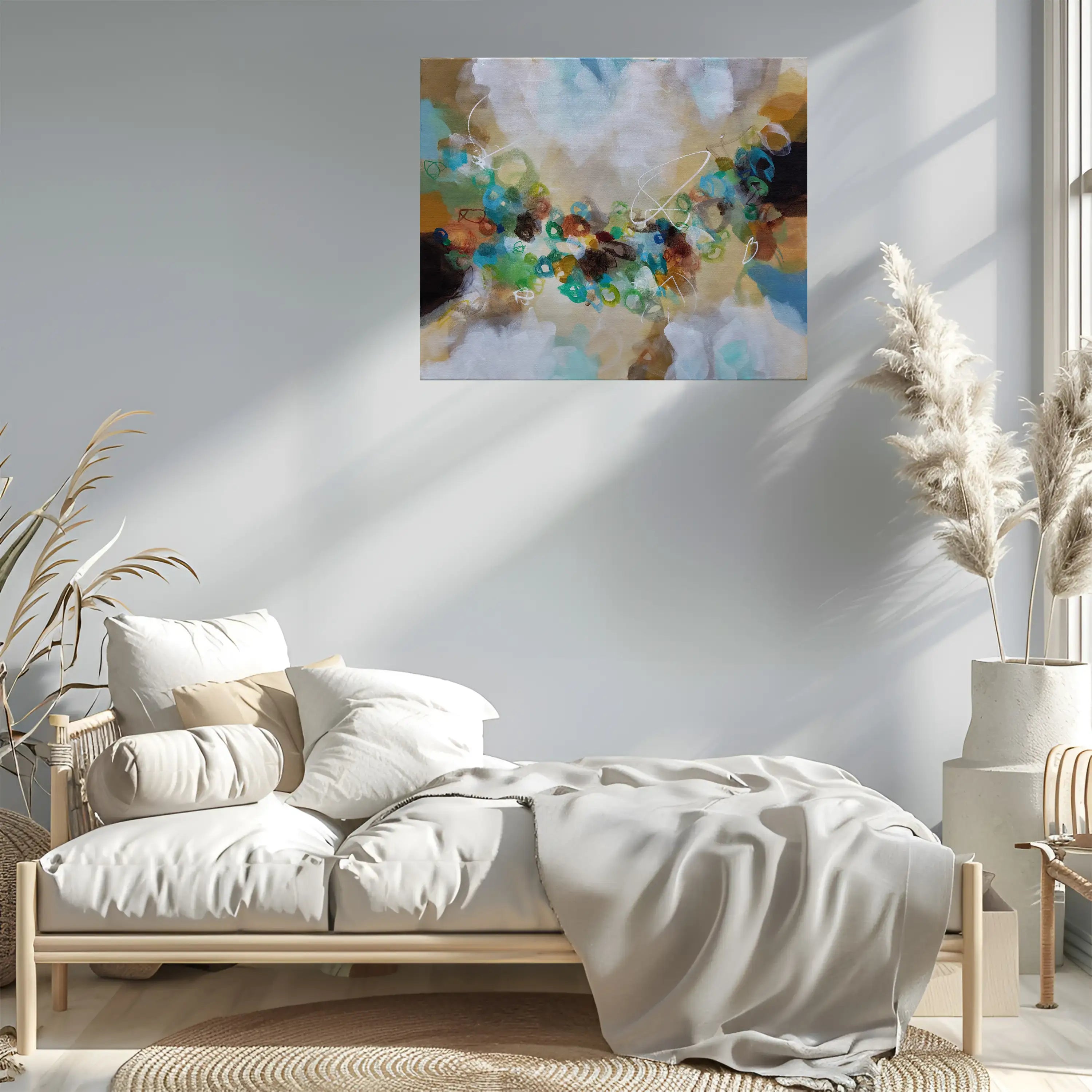 Modern bedroom with a bed, abstract painting on the wall, and decorative elements.