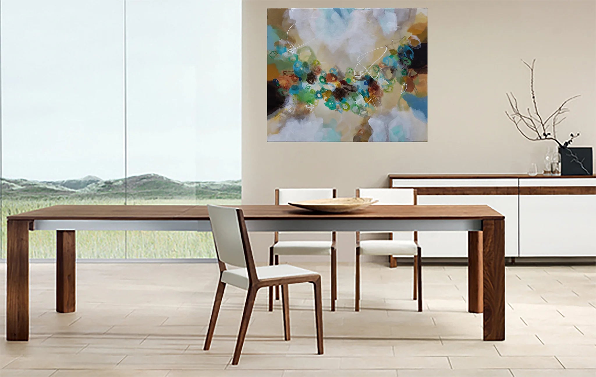 Dining room with wooden table and chairs, abstract painting on the wall.
