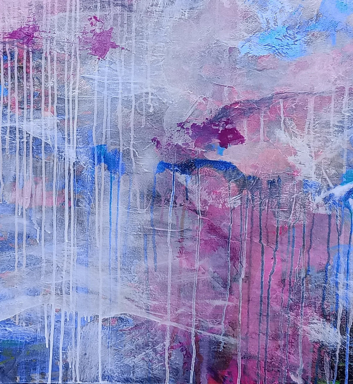 Abstract art with pink, blue, and white colors on a textured surface