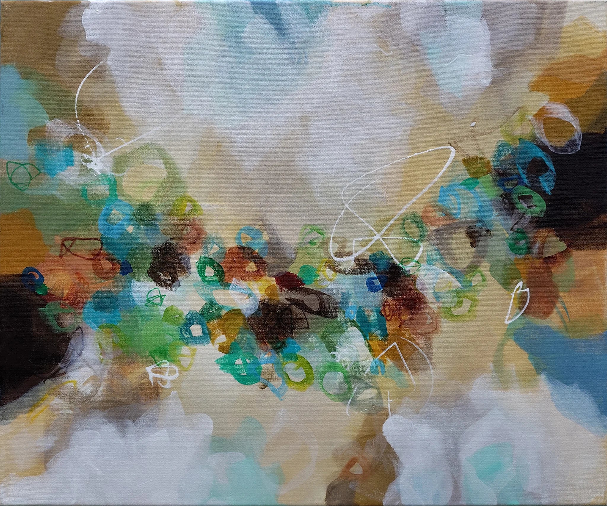Abstract artwork with colorful patterns and shapes on a textured surface