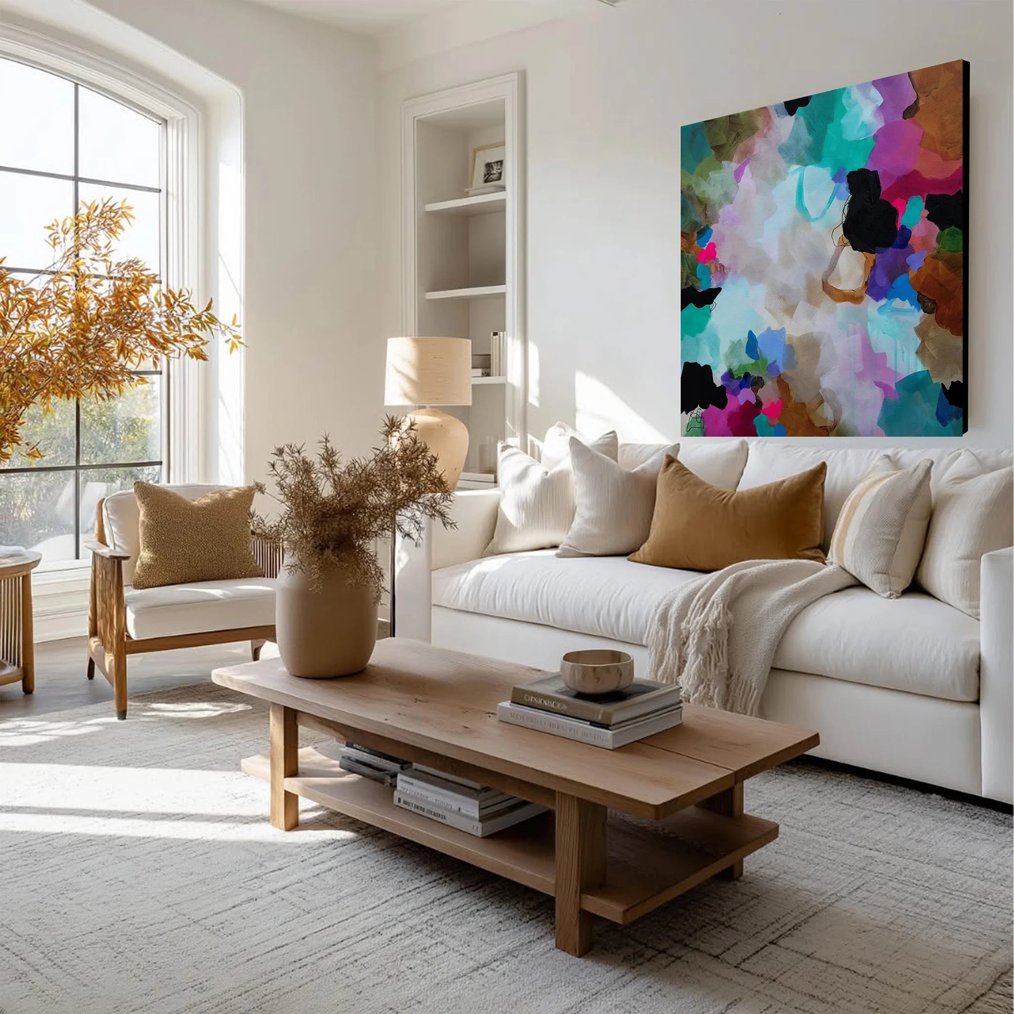 colour painting in lounge above cream sofa