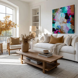 colour painting in lounge above cream sofa