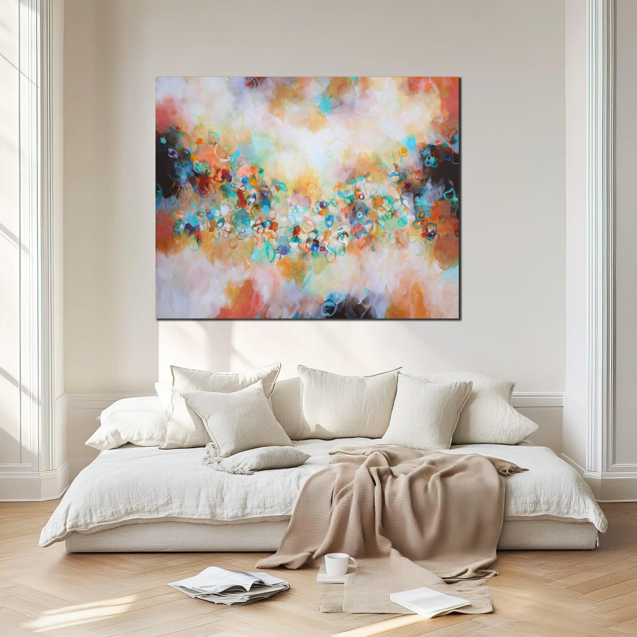 Colorful abstract painting above a bed in a bedroom
