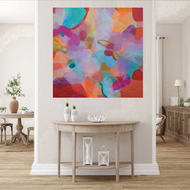 Colorful abstract painting on a wall in a living room setting.
