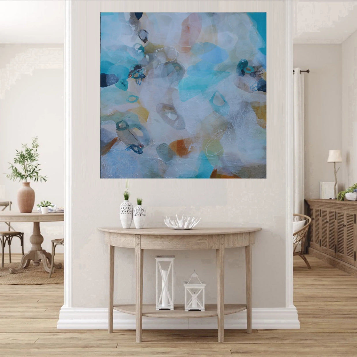 Living room with a large abstract painting on the wall above a wooden console table.
