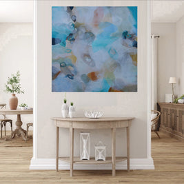 Living room with a large abstract painting on the wall above a wooden console table.