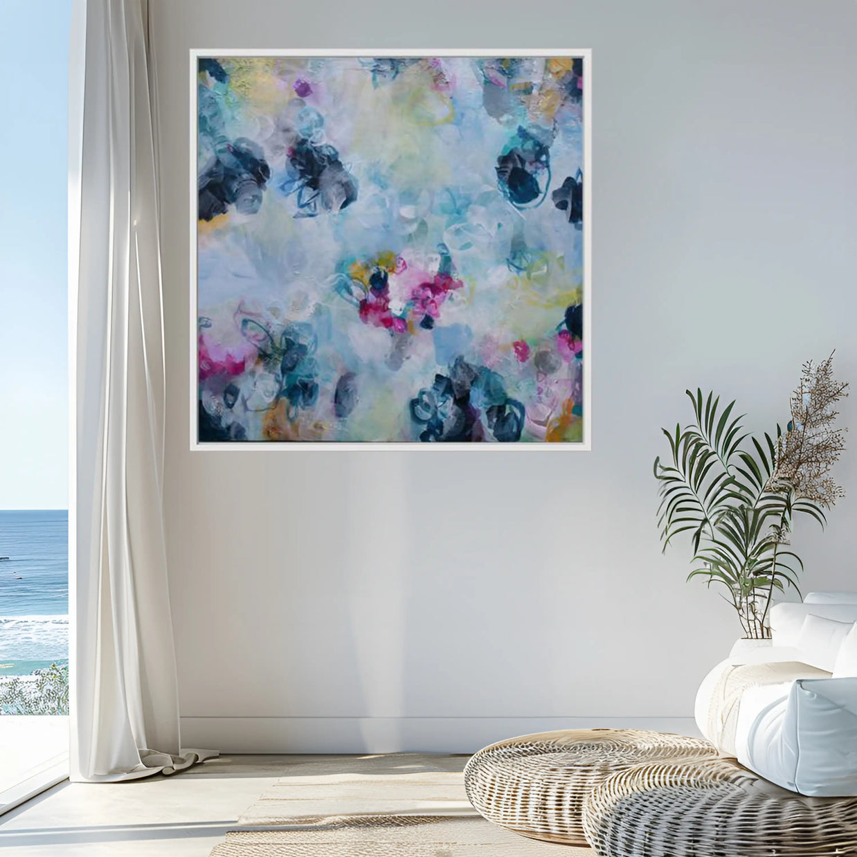 Colorful abstract painting on a wall in a room with a plant and window.