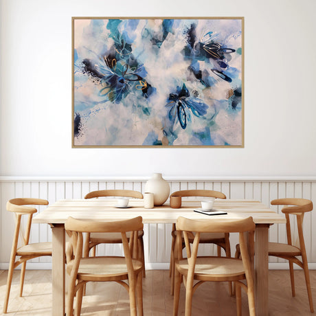 Dining room with wooden table and chairs, and a large abstract painting on the wall.