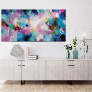 Modern living room with a colorful abstract painting above a wooden cabinet.