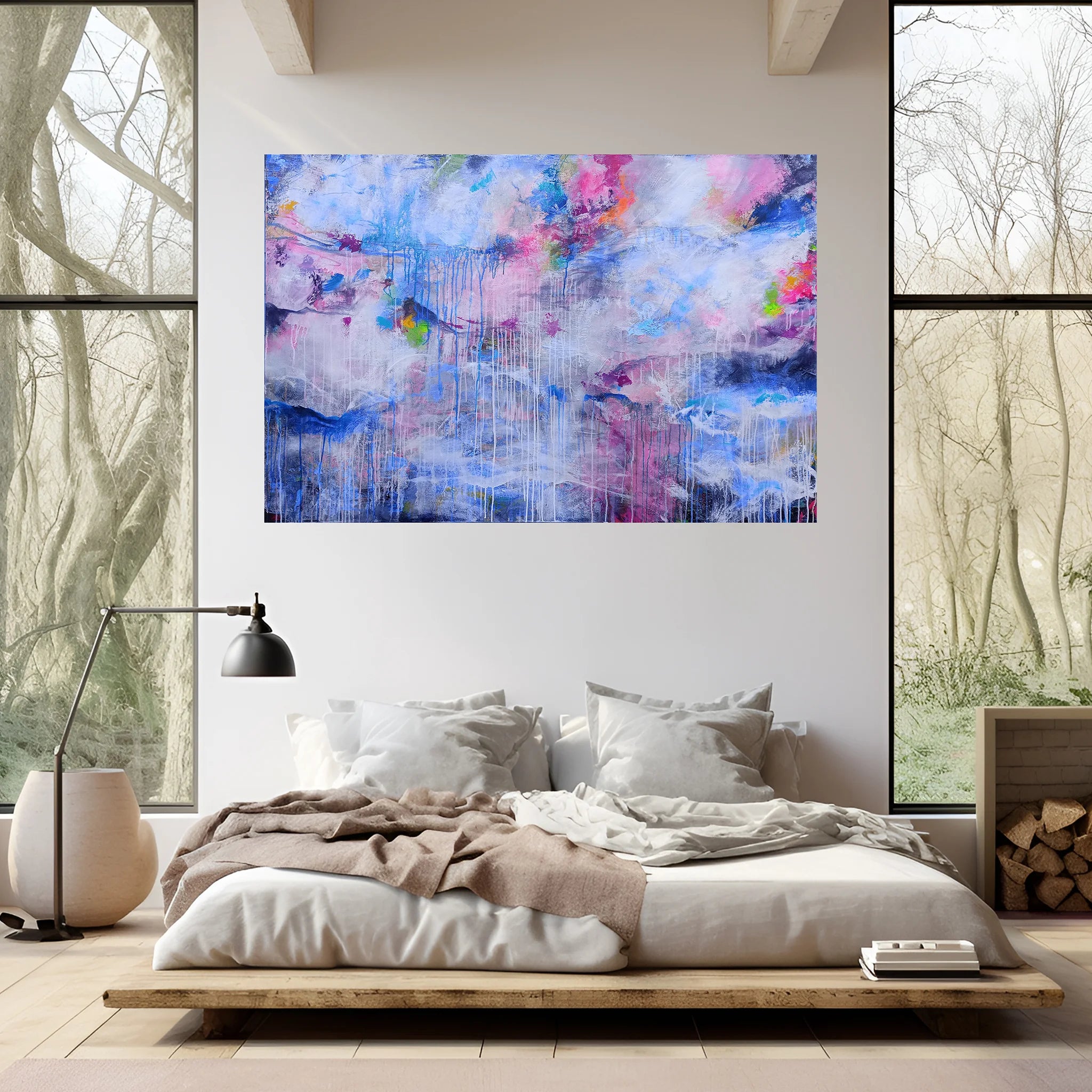 Modern bedroom with a colorful abstract painting on the wall