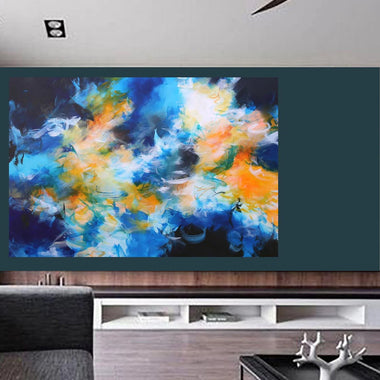Modern lounge with a colorful abstract painting above a bed.