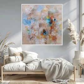 Modern bedroom with abstract art on the wall, bed with white bedding, and decorative plants.