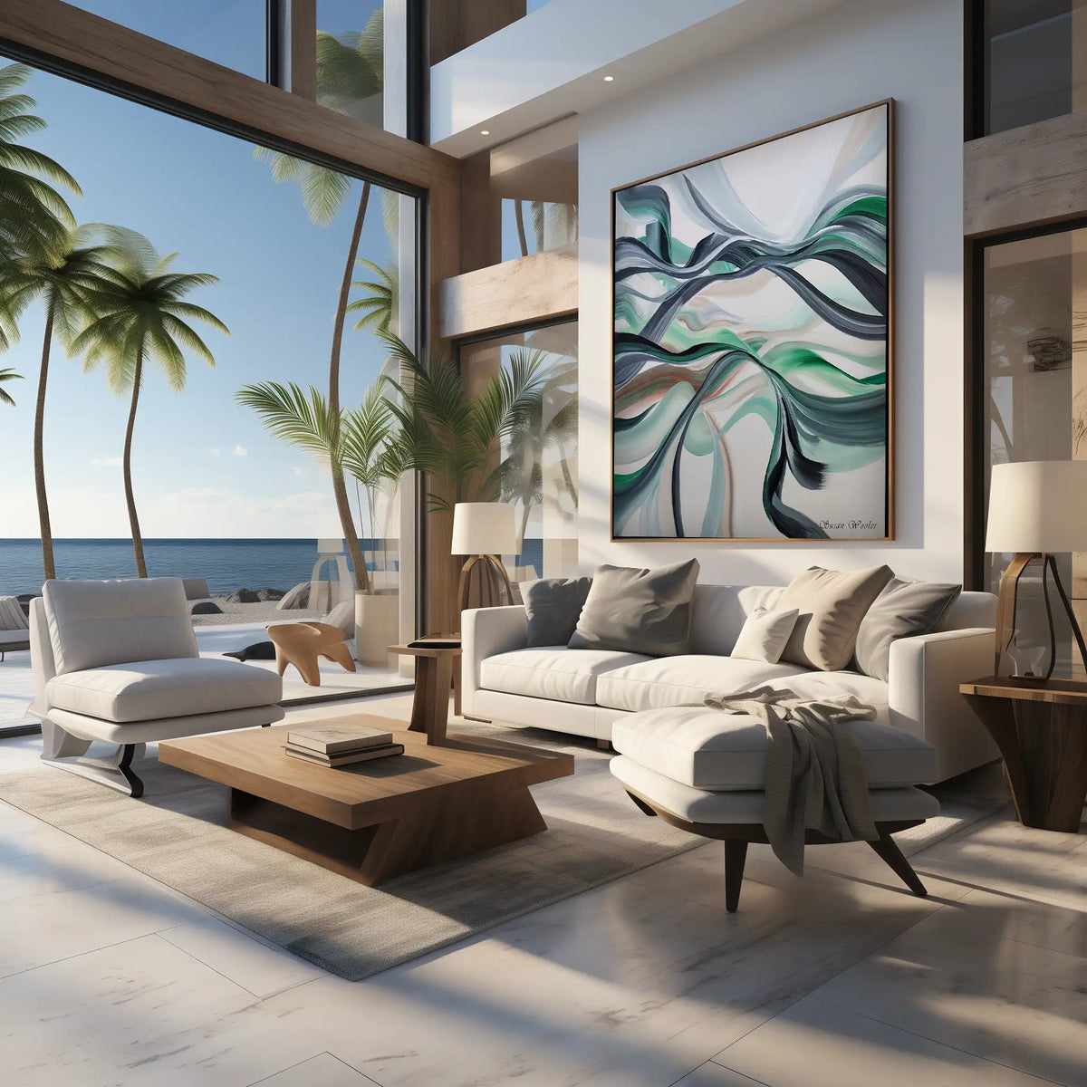 A modern living room with a white sectional sofa, wooden coffee table, and a large framed abstract wall art piece above the couch. The room has tall windows overlooking a beach and palm trees, with a light stone floor and warm natural lighting.