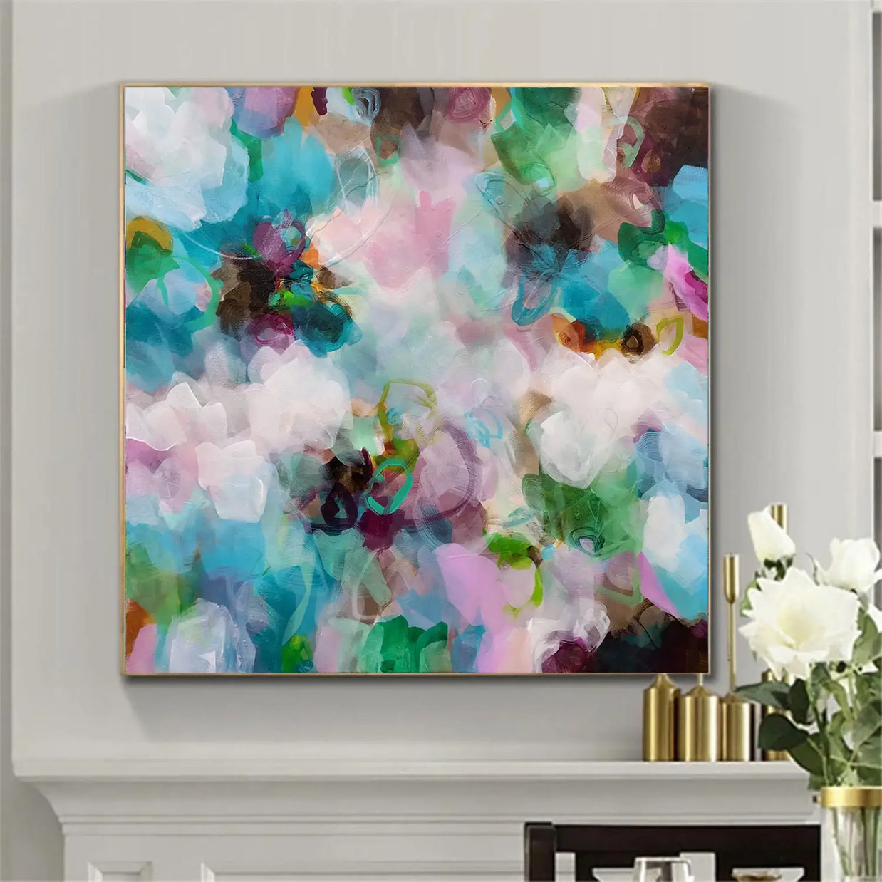 Abstract colorful painting on a wall with decorative elements below.