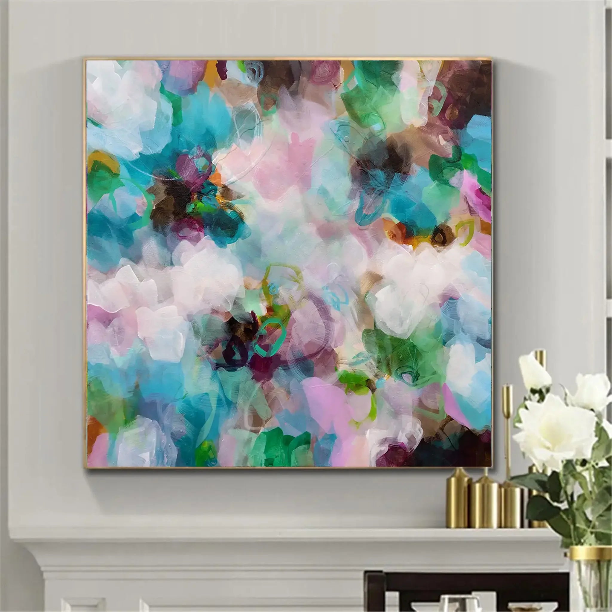 Abstract colorful painting on a wall with decorative elements below.