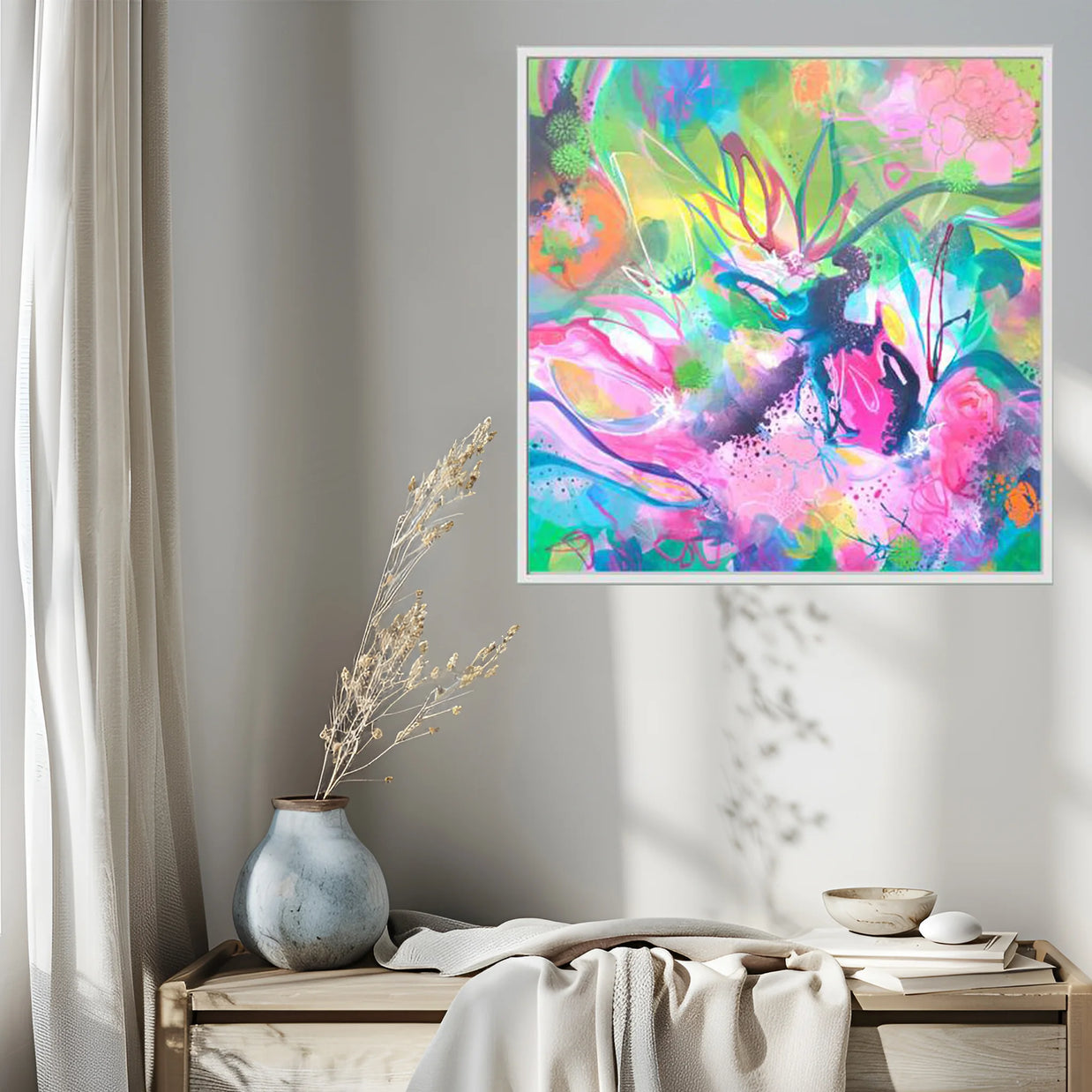 Colorful abstract painting on a wall above a wooden bench with decorative items.