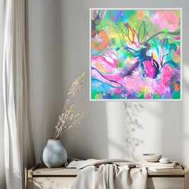 Colorful abstract painting on a wall above a wooden bench with decorative items.